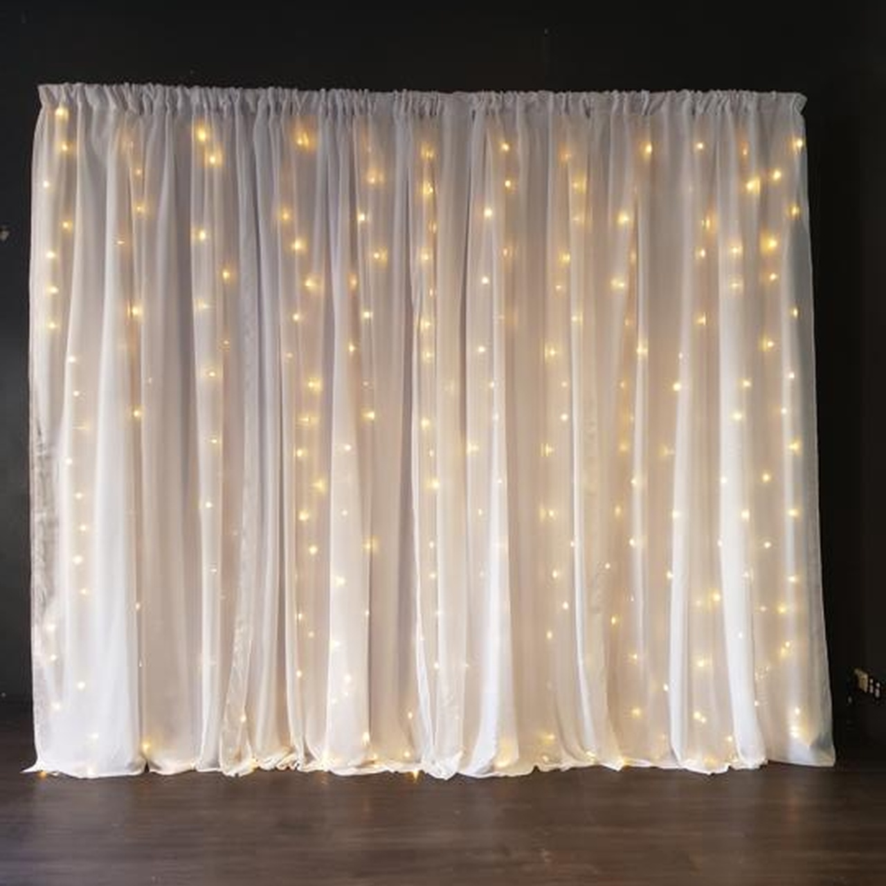 White Curtain Backdrop with Fairy Lights